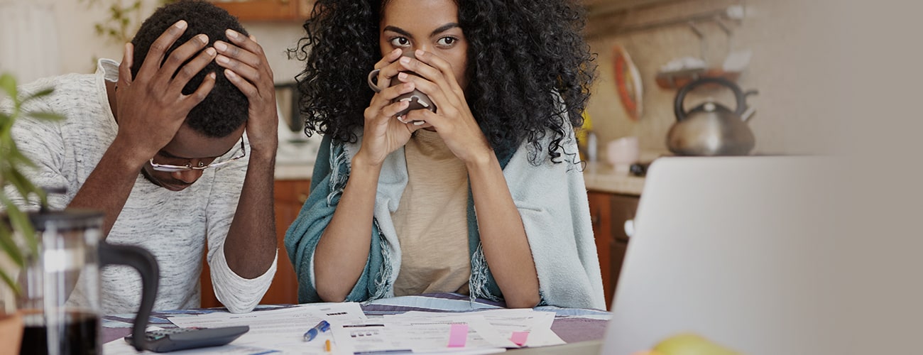 Stressed unemployed husband with many debts